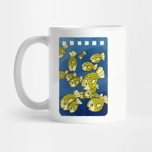 Flat, golden fish in a pack Mug